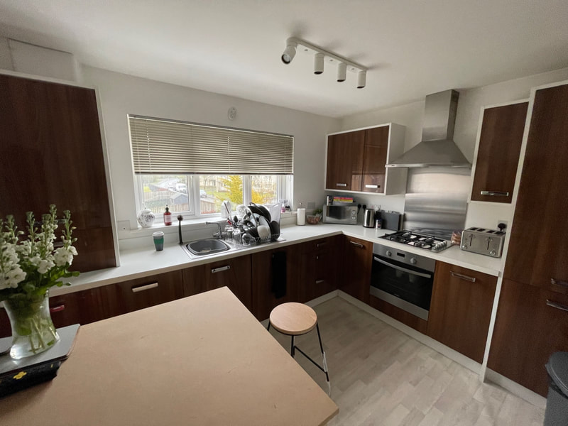 dark-wood-kitchen-cabinets-steel-extractor What's Included in a Door-Wrapping Job