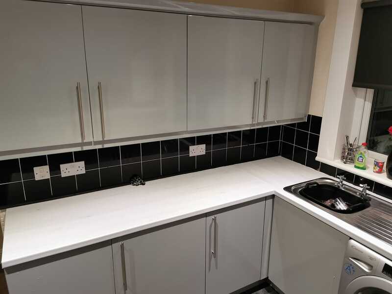 grey-gloss-cabinets-black-tile-splashback From First Call to Finished Splashback