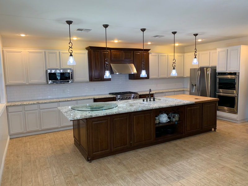 large-kitchen-dark-wood-island-pendant-lights From Cabinet Doors to Ceilings: What a Kitchen Repaint Involves