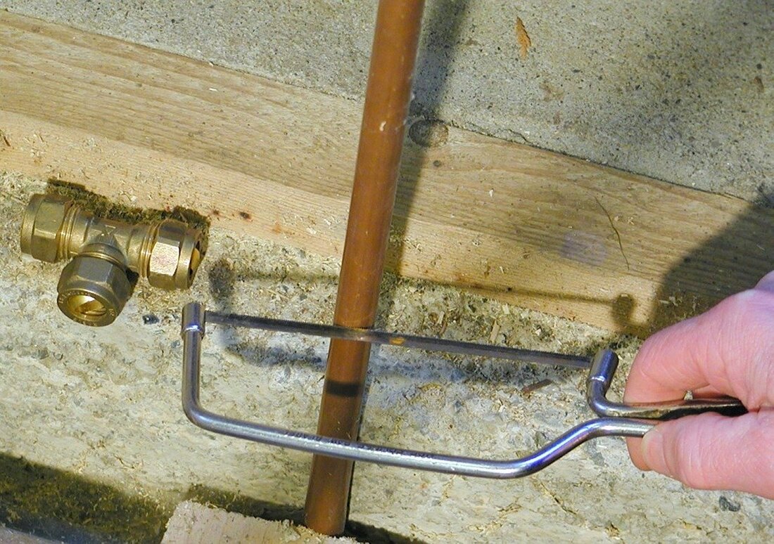professional-plumber-working-on-kitchen-fitter-2 Why Homeowners Trust Us to Put Right What Others Got Wrong