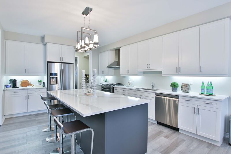 white-kitchen-with-marbled-quartz-island How a Worktop Job Actually Runs, Site Visit to Sign-Off
